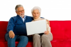 Elderly couple with laptop