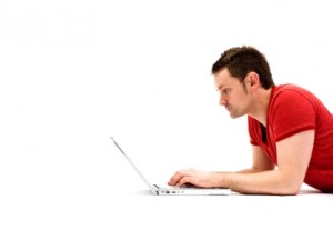 Student guy using laptop