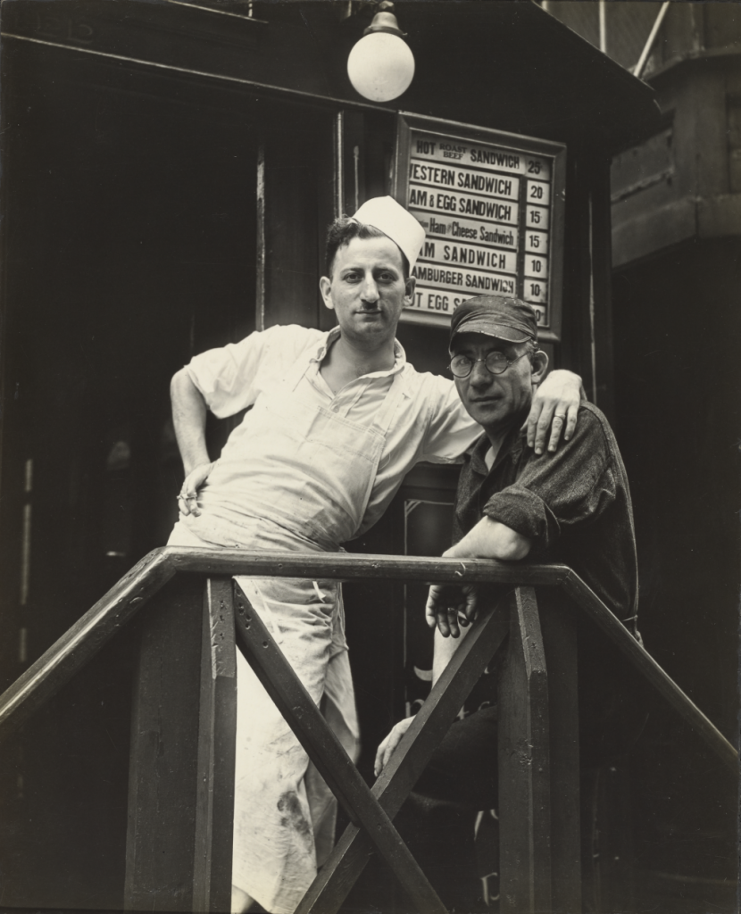 workers pose showing relationship