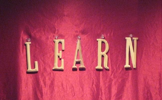 A photo saying learn