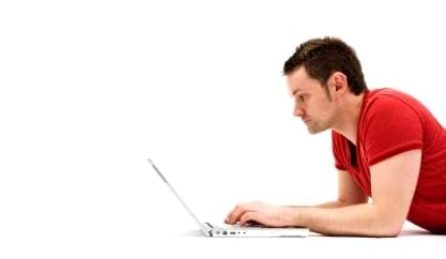 Student guy using laptop
