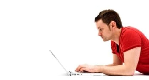 Student guy using laptop